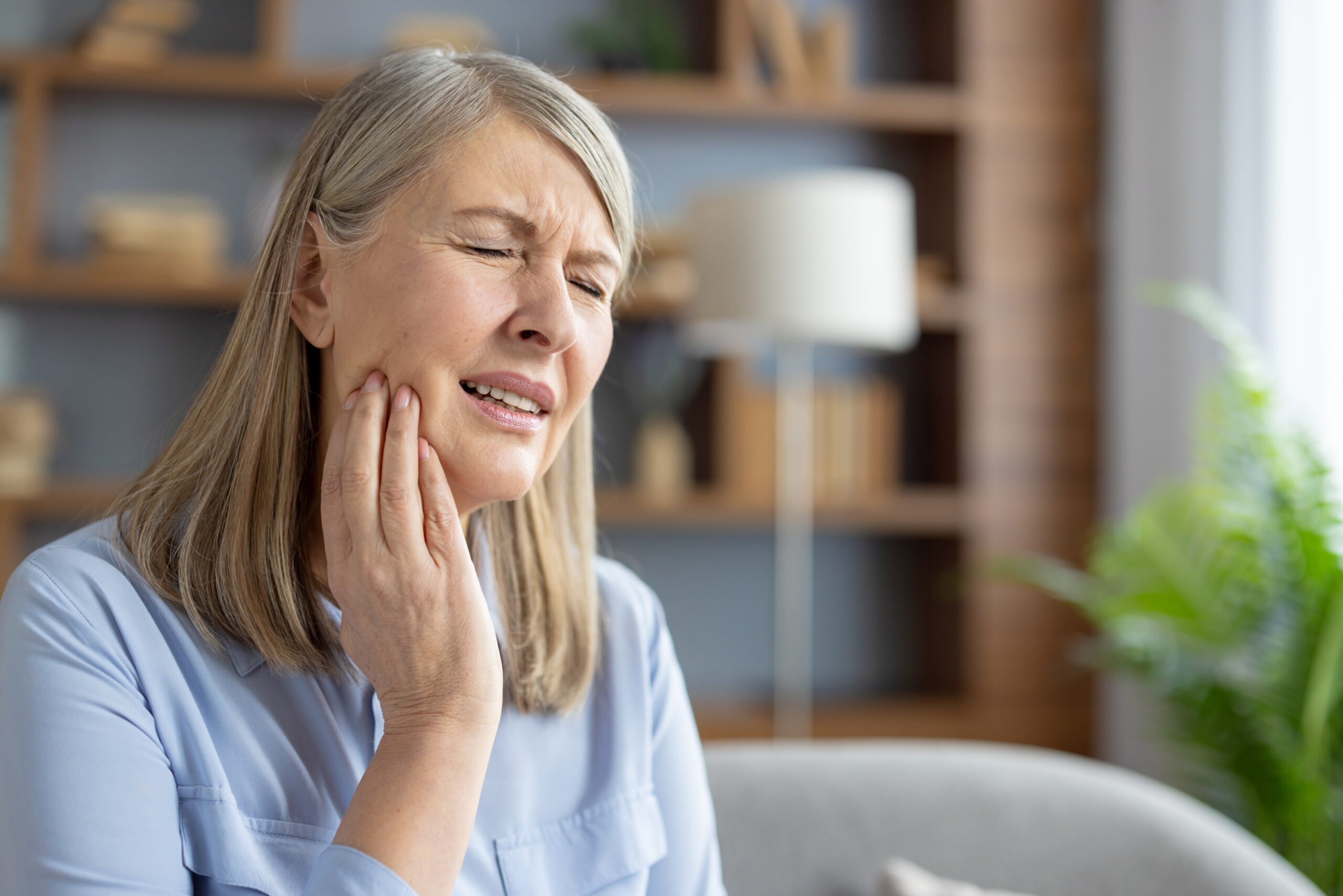 Woman with Tooth Pain Dental Emergency